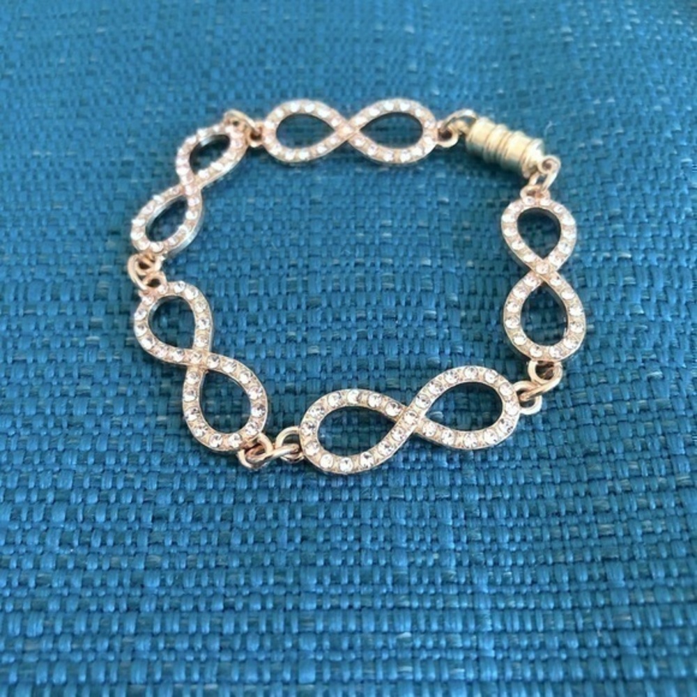 Infinity charm bracelet with rhinestones